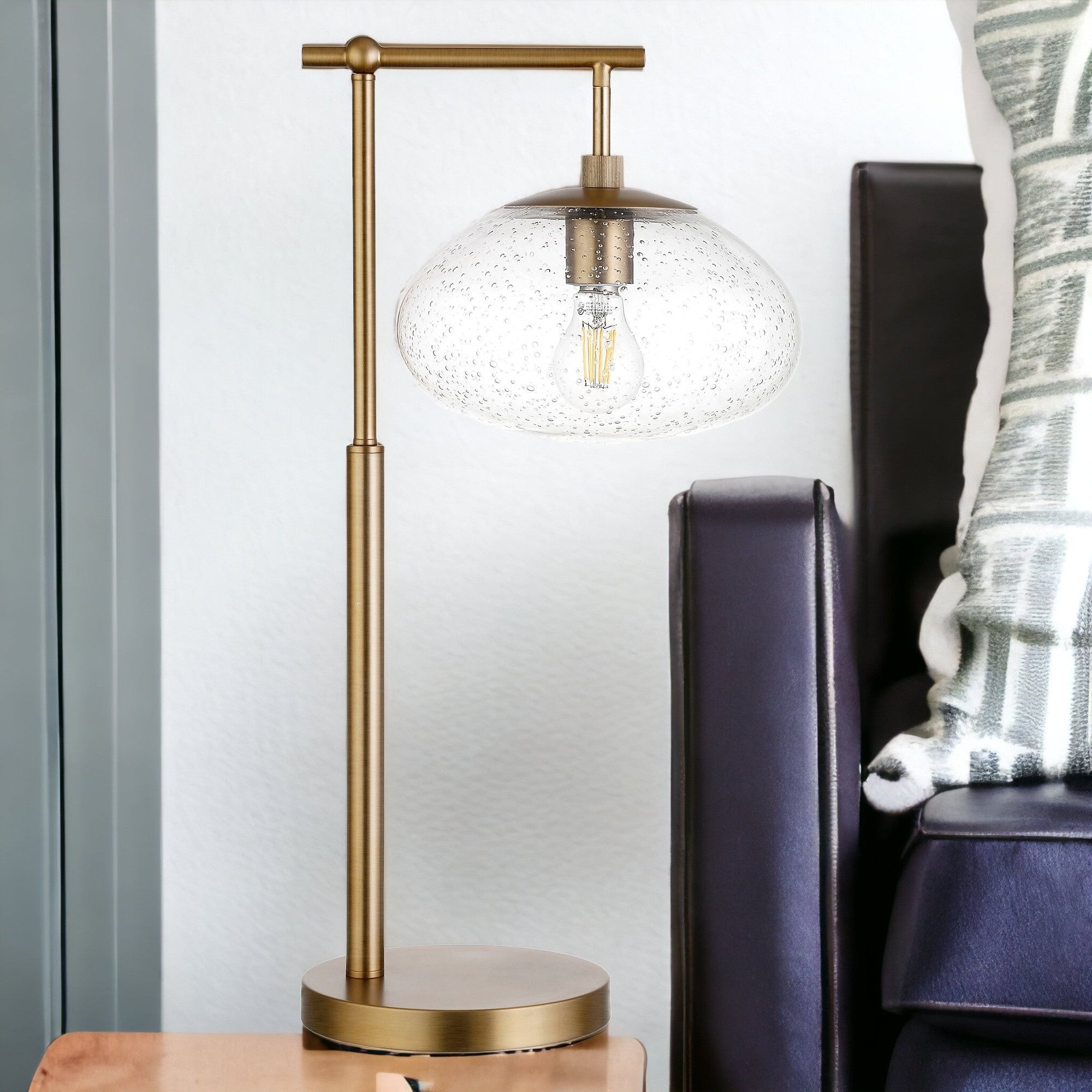 25 Brass Metal Arched Table Lamp With Clear Seeded Globe Shade